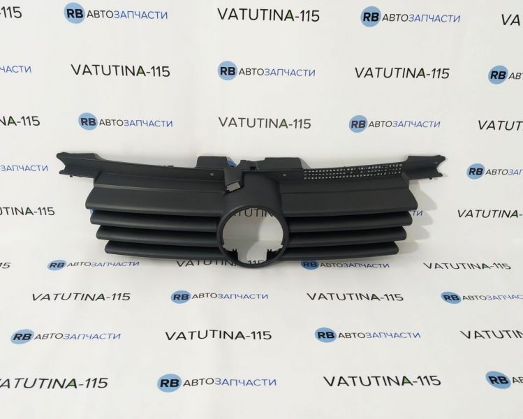 KH9543990 Решітка радіатора -ембл.