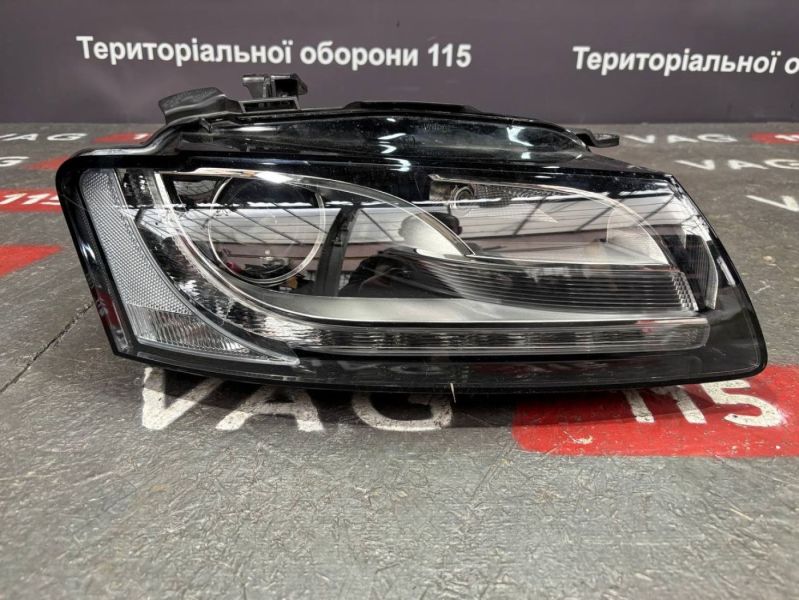 8T0941004L-BU Фара основна R під ксенон